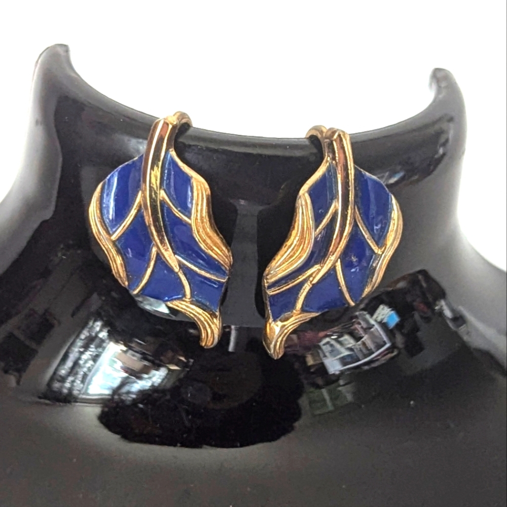 Vintage Trifari clip on gold toned and blue leaf  earrings